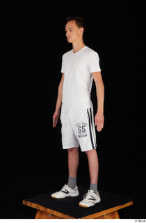  Johnny Reed dressed grey shorts sneakers sports standing white t shirt whole body 0002.jpg